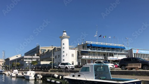 Viareggio harbor and canal with boats in docks, Lucca, Tuscany, Italy. Popular seaside resort and the home of the famous carnival of Viareggio. photo