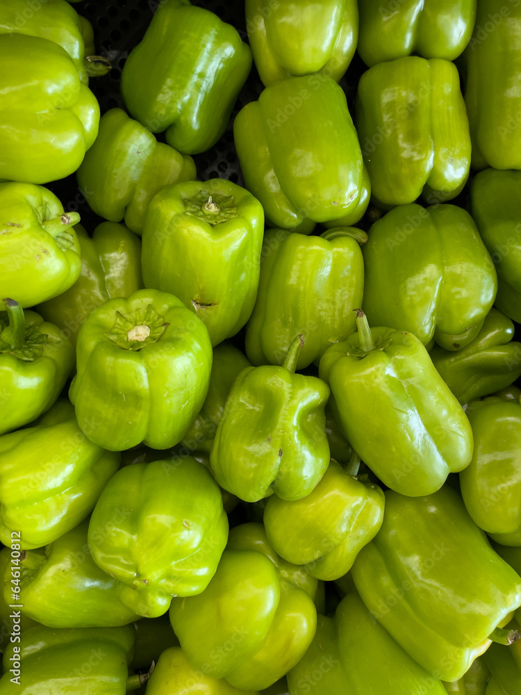 Green Capsicum is a genus of flowering plants in the nightshade family Solanaceae, native to the Americas, cultivated worldwide for their chili pepper or bell pepper fruit. Green Capsicum is a genus of flowering plants in the nightshade family Solanaceae, native to the Americas, cultivated worldwide for their chili pepper or bell pepper fruit.