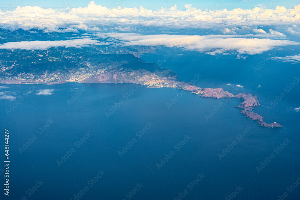Aerial view of the ocean, the southeast coastline of Madeira Island and the foothills of the Sao Lourenco coastal cliffs. Day shot, Madeira, Portugal, Europe.