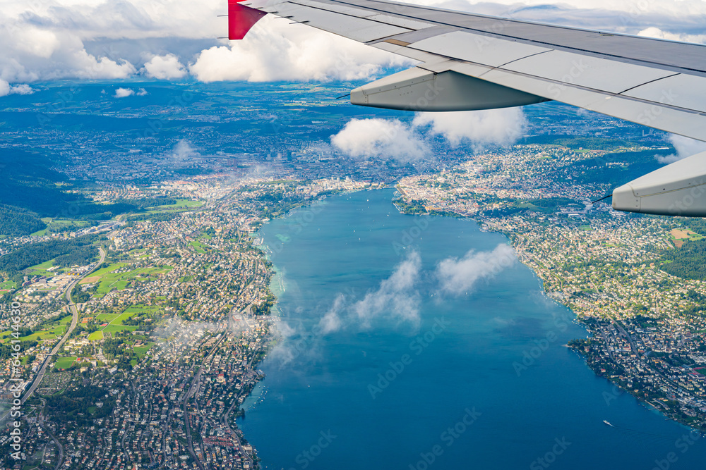 Aerial view of Zuerich and Lake Zuerich on a cloudy summer day photographed from passenger plane. Zürich, Switzerland, Europe.