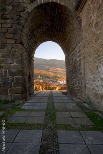 vertical stone arch with landscape in the background, Hervas photo