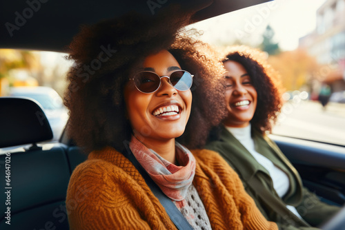 Two Happy Black Women in a Car
