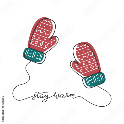 Warm knitted mittens isolated on white. Hand drawn outline winter clothing element. Stay warm Handwritten lettering. Doodle cozy background