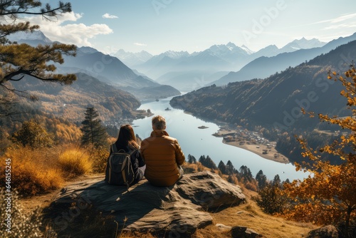 Senior couple traveling and gazing an amazing landscape photo