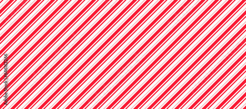 Red and pink lines seamless pattern. Candy cane diagonal stripes background. Repeating decoration wallpaper. Winter holidays linear backdrop. Christmas peppermint present wrapping print design. Vector