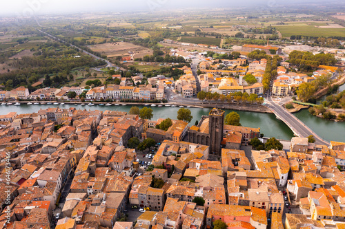Scenic cityscape of town Agde and River Herault, southern France