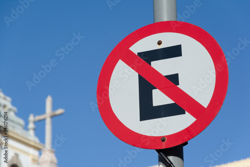 Traffic sign indicating that it is prohibited to stop the vehicle in Pelourinho, historic center of Salvador, Bahia. photo