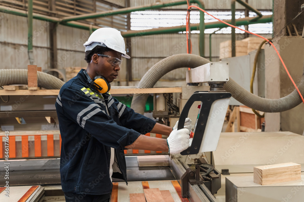 Black man worker working in wood distributor factory Black man worker working in wood distributor factory