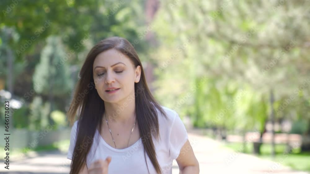The woman was walking fast. Outdoor walking. The woman was walking fast. Outdoor walking.
