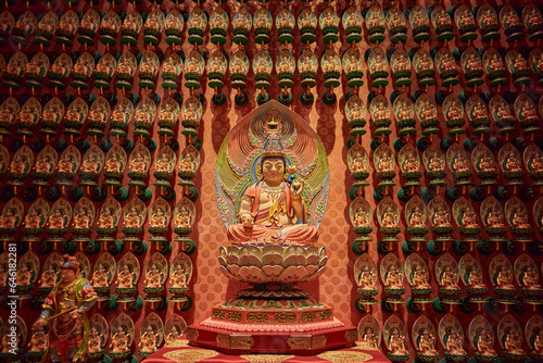 Photography The large Buddha statue at the Buddha Tooth Relic Temple in Singapore, surrounde