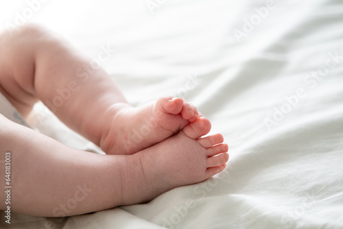 Close-up of the little feet of a newborn baby © Olja Reka