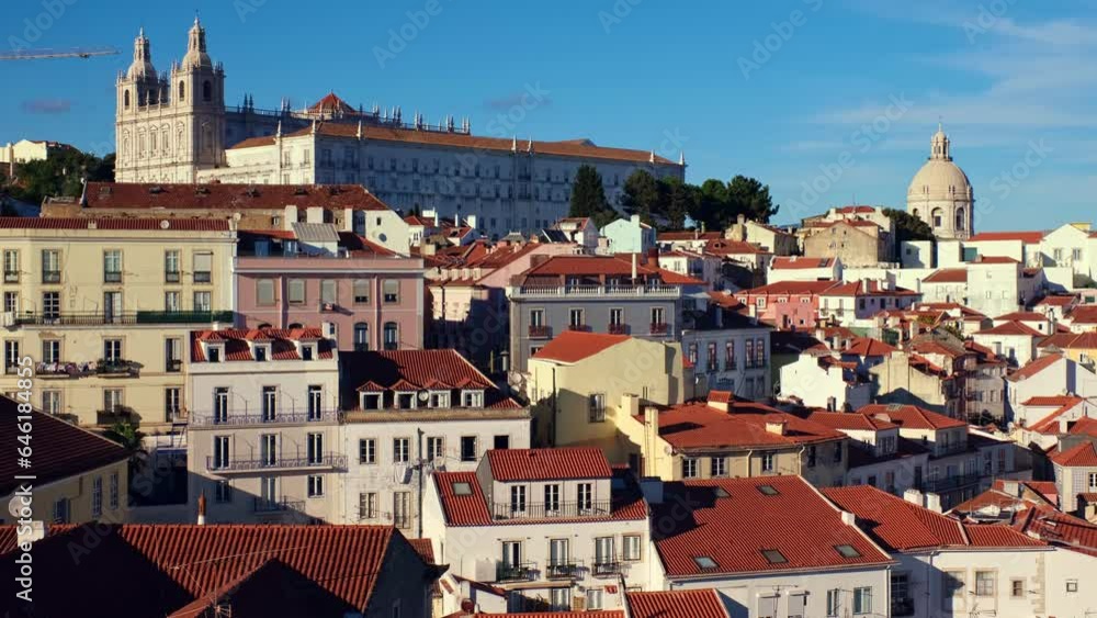 Lisbon famous view from Miradouro de Santa Luzia tourist viewpoint over Alfama old city district, cruise liner and moving clouds. Lisbon, Portugal. Camera pan Lisbon famous view from Miradouro de Santa Luzia tourist viewpoint over Alfama old city district, cruise liner and moving clouds. Lisbon, Portugal. Camera pan