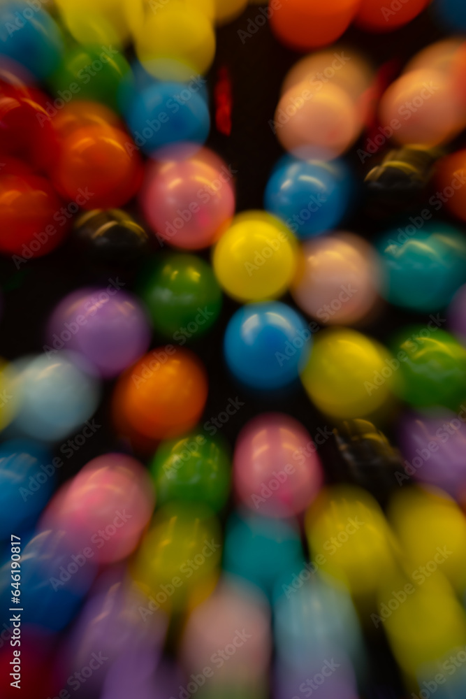 vertical abstract motion blur background of colored balloons at fair special movement effect created by long time exposure shutter speed and in camera movement fun celebratory party birthday backdrop vertical abstract motion blur background of colored balloons at fair special movement effect created by long time exposure shutter speed and in camera movement fun celebratory party birthday backdrop