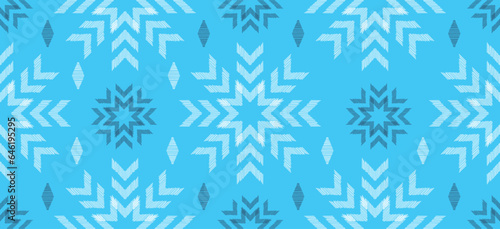 Motif Christmas ethnic handmade beautiful Ikat art. Christmas background. folk embroidery Christmas pattern  geometric art ornament print. blue white colors. snowflake  star  poinsettia design.