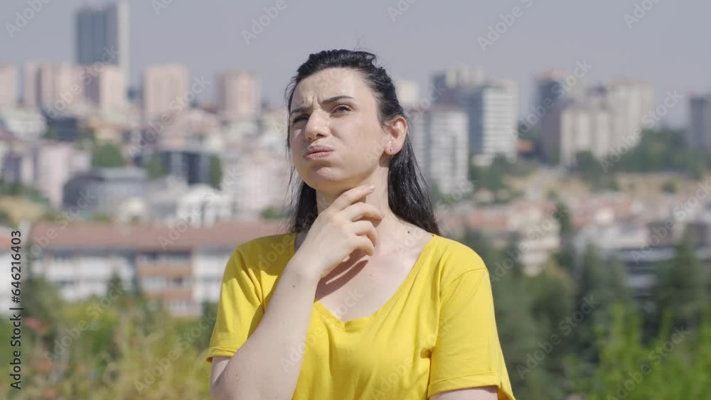Thoughtful woman in the park. Thoughtful woman in the park.