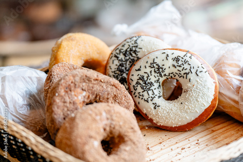 glazed doughnut covered with chocolate chips and more donuts - Mexican bread 