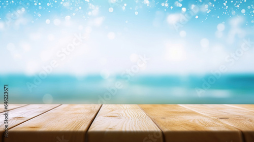 Empty wood table top on blur sparkling sea water and summer sky background