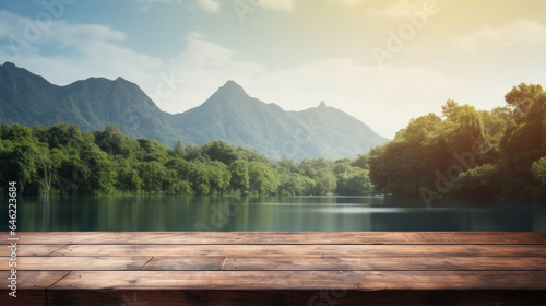 Blank wood tabletop with blurred background of river and mountain