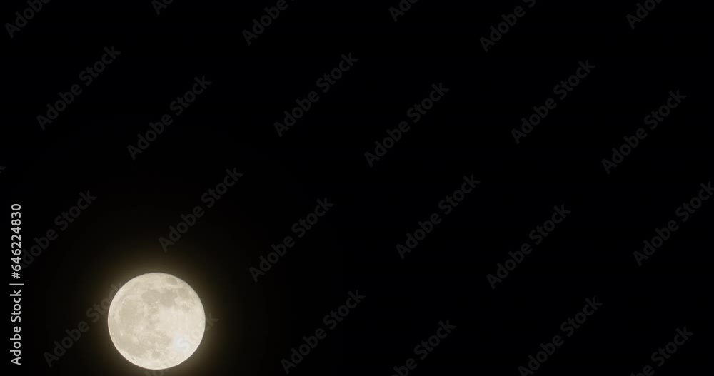 Moonrise in the black night sky. Fantastic fairy moon. Clear video with the moon. Background video. Full moon, loneliness, sadness and dreams in the full moon. Living emotions, frustration, freedom Moonrise in the black night sky. Fantastic fairy moon. Clear video with the moon. Background video. Full moon, loneliness, sadness and dreams in the full moon. Living emotions, frustration, freedom