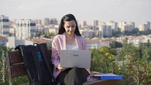 Businesswoman making negative gesture to camera. photo