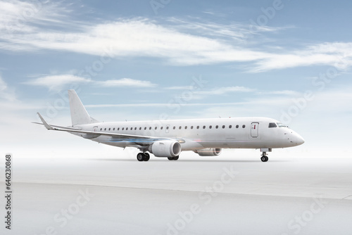 White passenger airliner isolated on bright background with sky