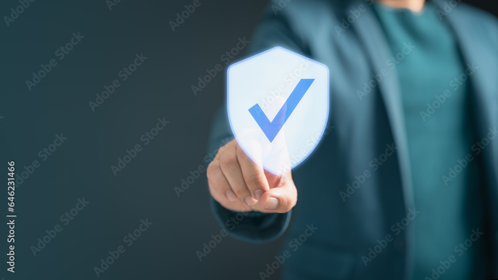 Certified warranty approval or secure access system concept. Businessman showing on hand identity proof icon for security protection system on virtual screen. Quality assurance of business service. Certified warranty approval or secure access system concept. Businessman showing on hand identity proof icon for security protection system on virtual screen. Quality assurance of business service.