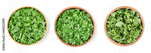 Set with cut parsley in bowls isolated on white, top view