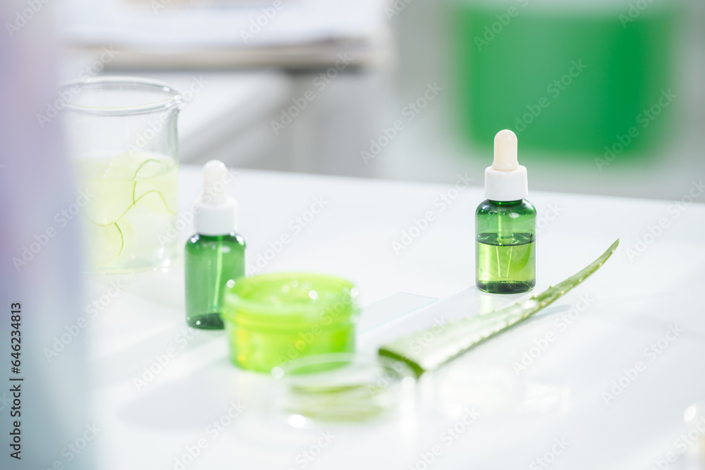 eco skin care beauty products in cosmetic laboratory development, Natural drug research with organic plant and scientific extraction in glassware, Alternative green herb medicine for body health care