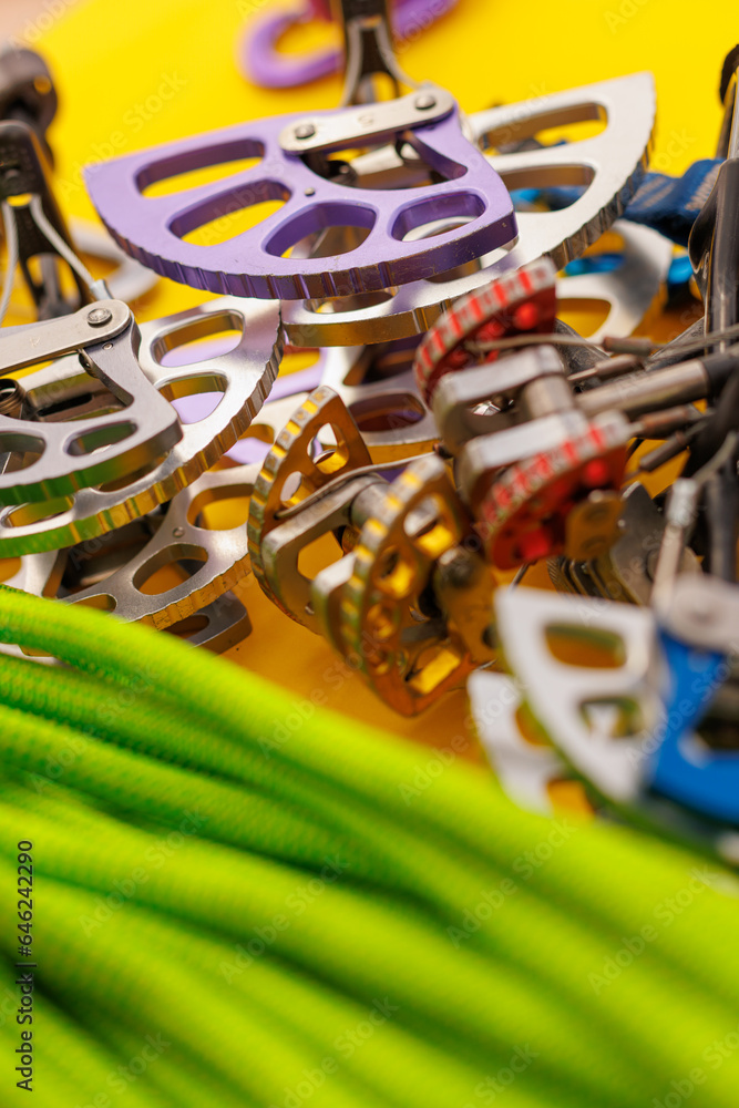Fototapeta premium climbing equipment. Camalot and rope. equipment for organizing insurance during mountaineering.