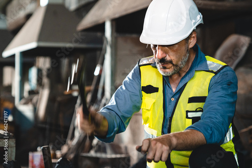 foreman with hard hat worki...