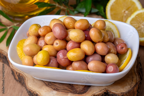 Scratched green olives. Tas...