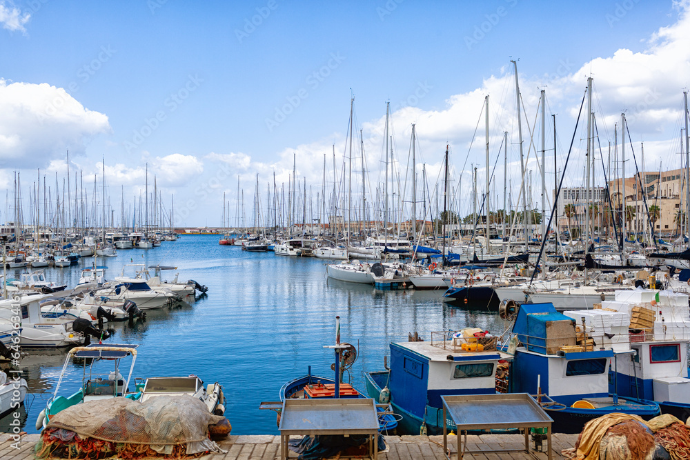 Palermo, Italy - August 5, 2023: Boats in the port in La Cala district of Palermo, Sicily