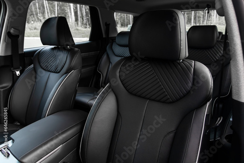 black front seats for driver and passenger. Salon of a new stylish car.