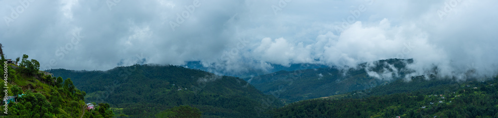 clouds floating over the mountain range,  Binsar road Kasardevi, Almora, Uttarakhand, rainy season, monsoon India