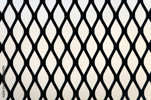 Expanded metal mesh panel pattern as background