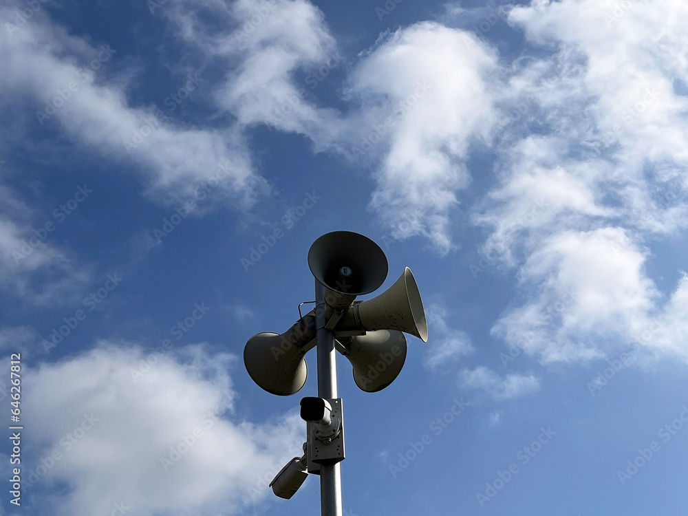 loudspeaker on a blue sky