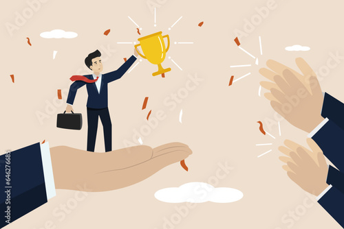 Success, success in achieving a target or the result of hard work, a smart young businessman succeeds in getting a big trophy and gets applause from his colleagues.