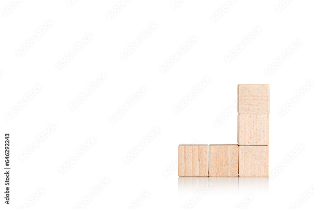 wooden cubes in the form of a ladder with a hand on an isolate white background wooden cubes in the form of a ladder with a hand on an isolate white background