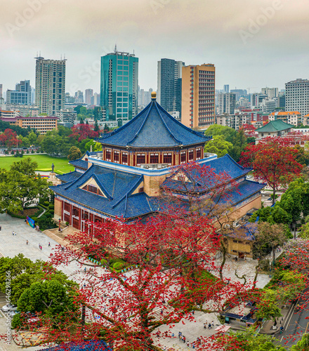 Sun yat-sen memorial hall in guangzhou, guangdong province, kapok blossom scenery photo