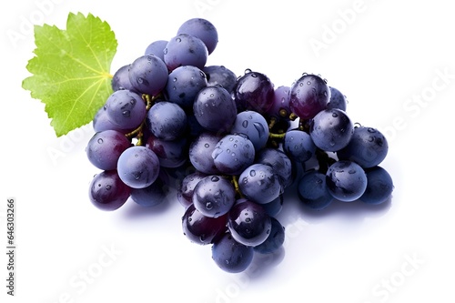 Bunch of black grapes with green leaves isolated on white background