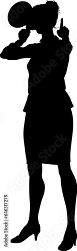 Protestor or demonstrator at a demonstration march, picket line or strike protest rally in silhouette. Using a megaphone, mega phone or bullhorn.