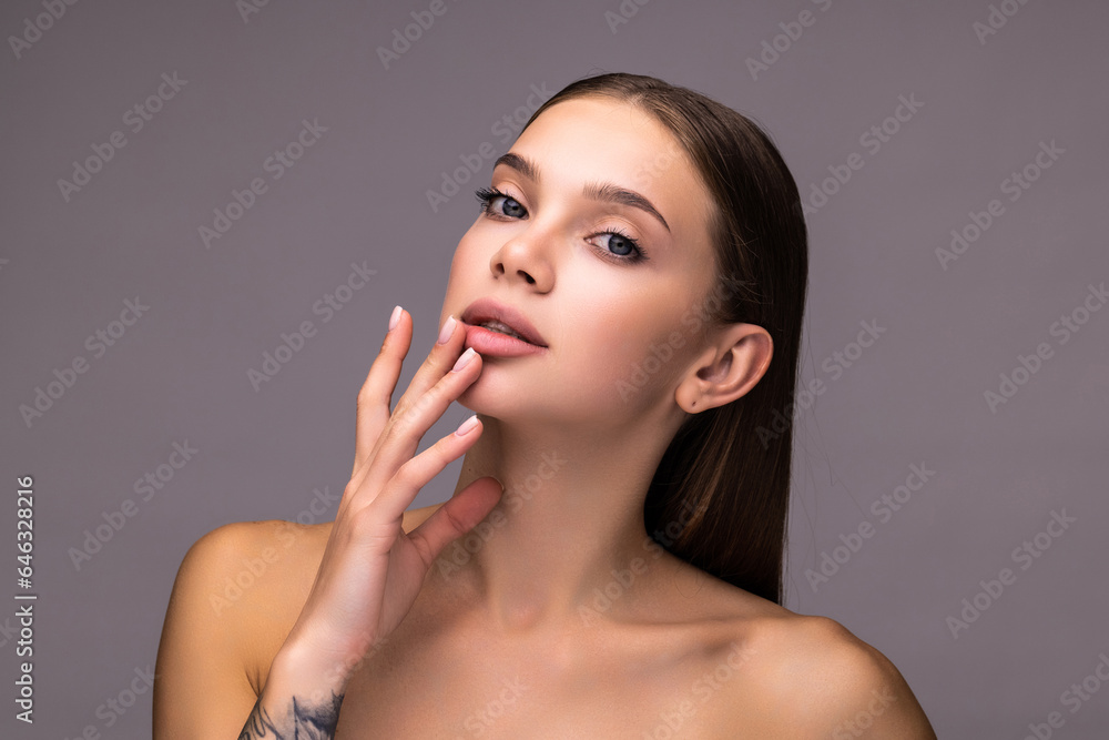 Portrait of young beautiful woman with perfect smooth skin isolated over white background. Tenderness and sensuality. Portrait of young beautiful woman with perfect smooth skin isolated over white background. Tenderness and sensuality.