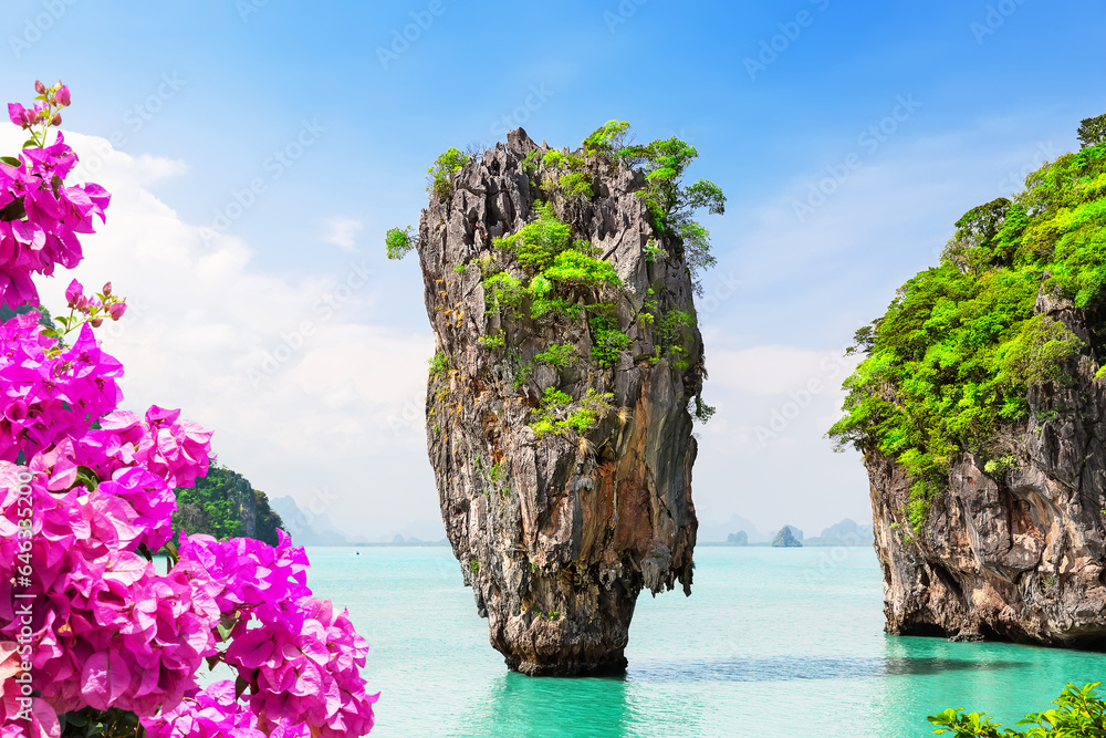 Obraz premium Travel photo of James Bond island with beautiful turquoise water in Phang Nga bay, Thailand.
