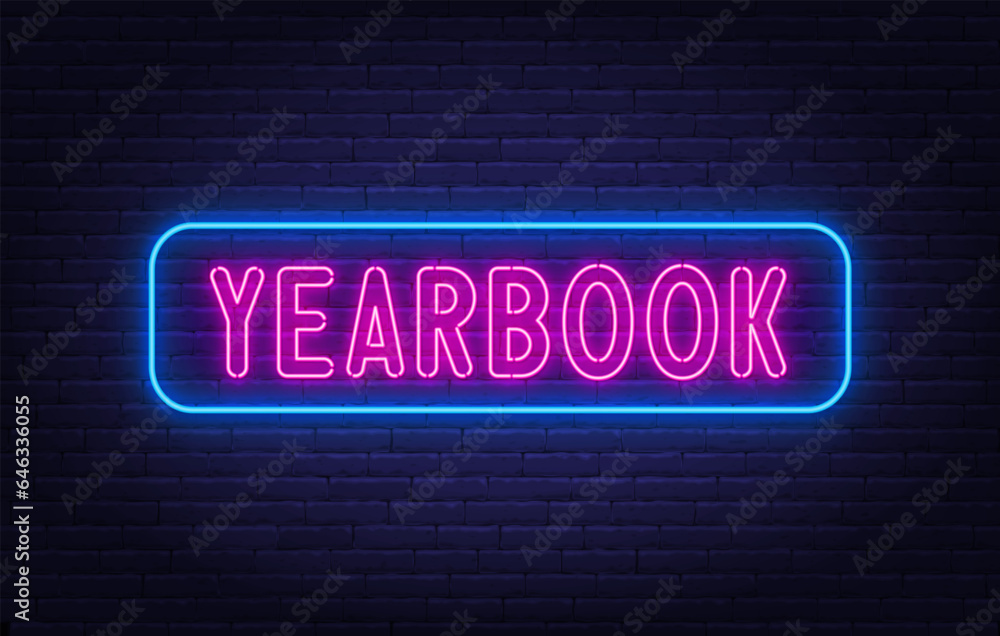 Yearbook neon sign on brick wall background. Yearbook neon sign on brick wall background.