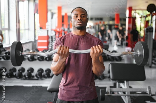 African American young man doing workout at the gym