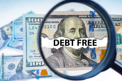 Debt free logo. Dollars under magnifying glass. Financial concept. Economic freedom. Credit independence. Denial of debt. Background for economic presentation. Debt free philosophy. 3d image