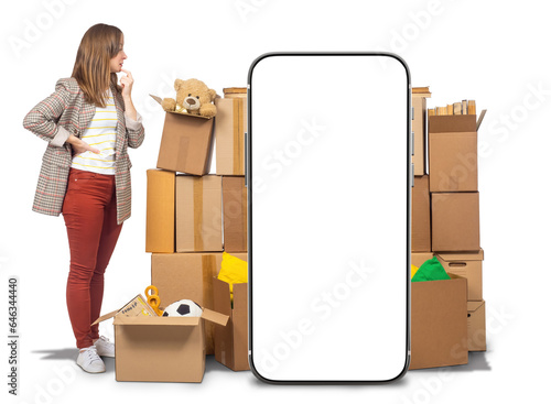 Woman with moving boxes. Ph...