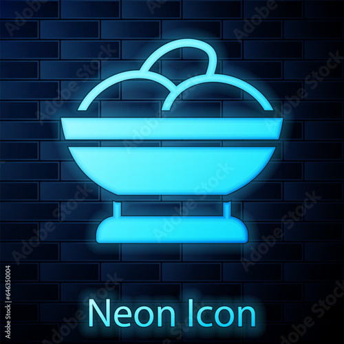 Glowing neon Varenyky in a bowl icon isolated on brick wall background. Pierogi, varenyky, dumpling, pelmeni, ravioli. Traditional Ukrainian food. Vector