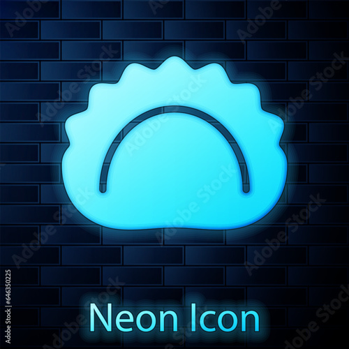 Glowing neon Dumplings icon isolated on brick wall background. Pierogi, varenyky, pelmeni, ravioli. Traditional Ukrainian food. Vector