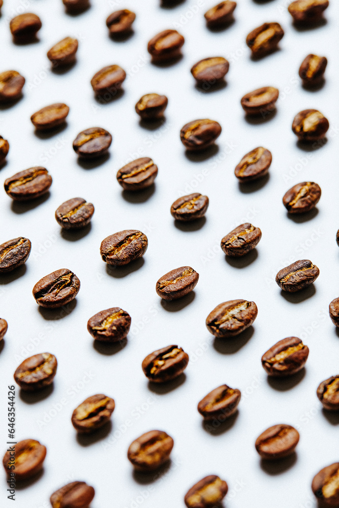 Coffee beans on white background - stock photo Coffee beans on white background - stock photo
